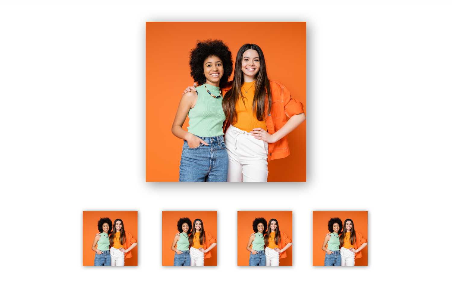 Two young women stand side by side smiling, one with curly hair in a green top and jeans, the other with straight hair in an orange shirt and white pants, against an orange background. Four smaller copies of this image showcase stunning Metal Photo Prints. Prints 4 You